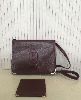 CARTIER sac a main cuir rouge vintage avec porte carte